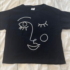Black T-Shirt with Abstract Face Design